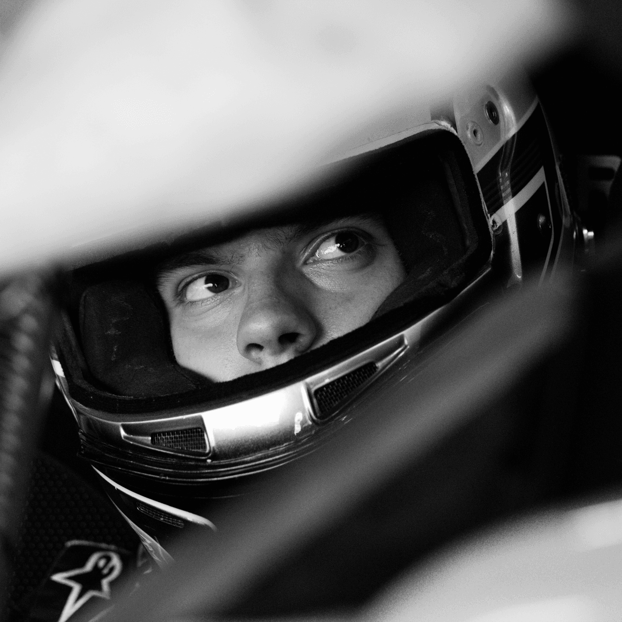 Racing driver in a helmet